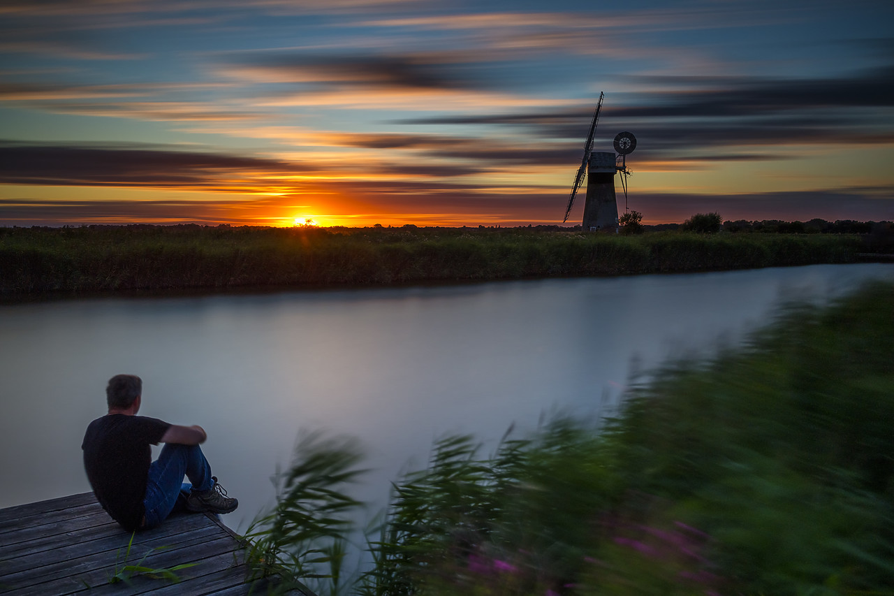 #400162-1 - Person Enjoying Sunset by River Thurne, Norfolk Broads National Park, Norfolk, England