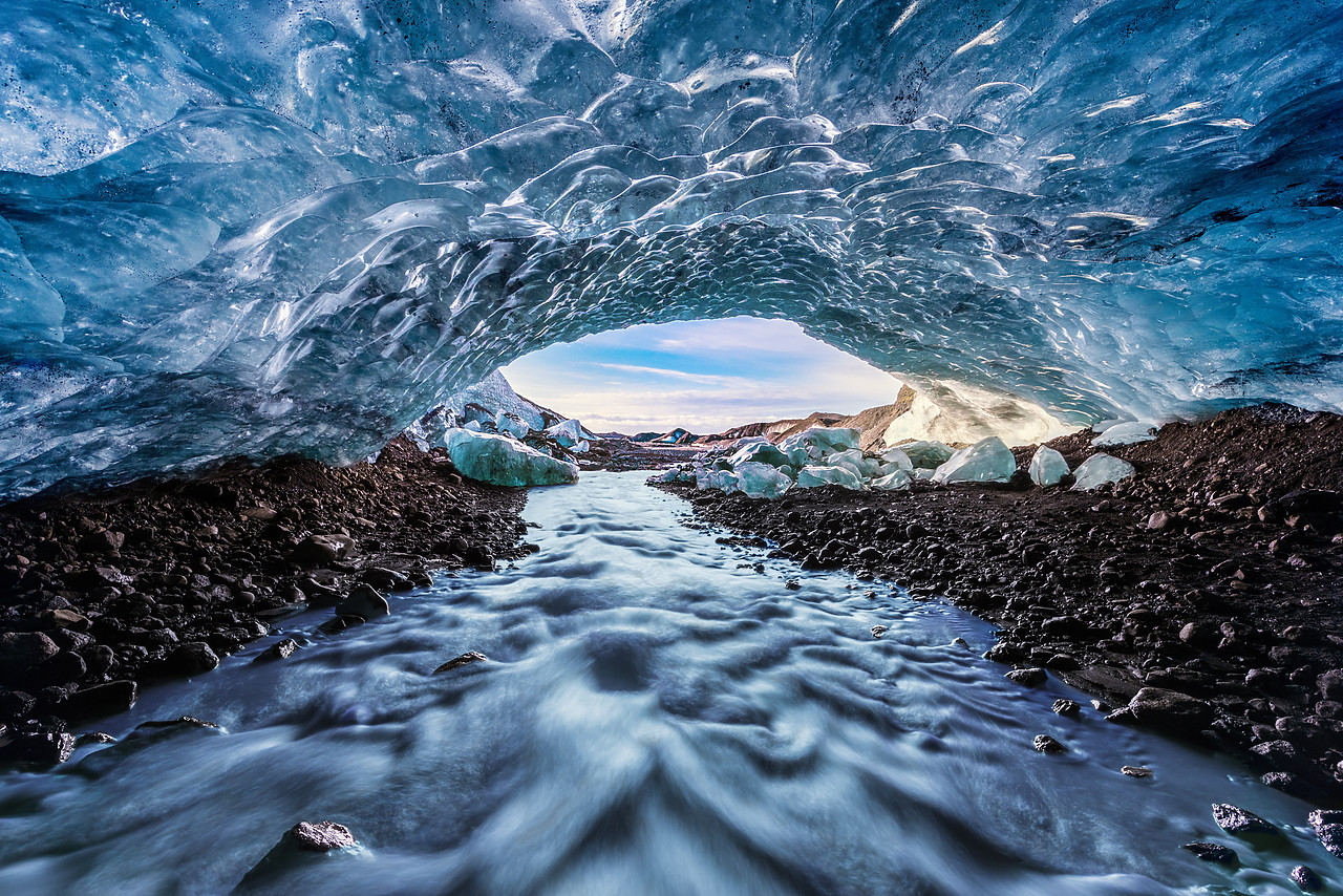 #130111-1 - Water Flowing Out of Glacial Ice Cave, Iceland
