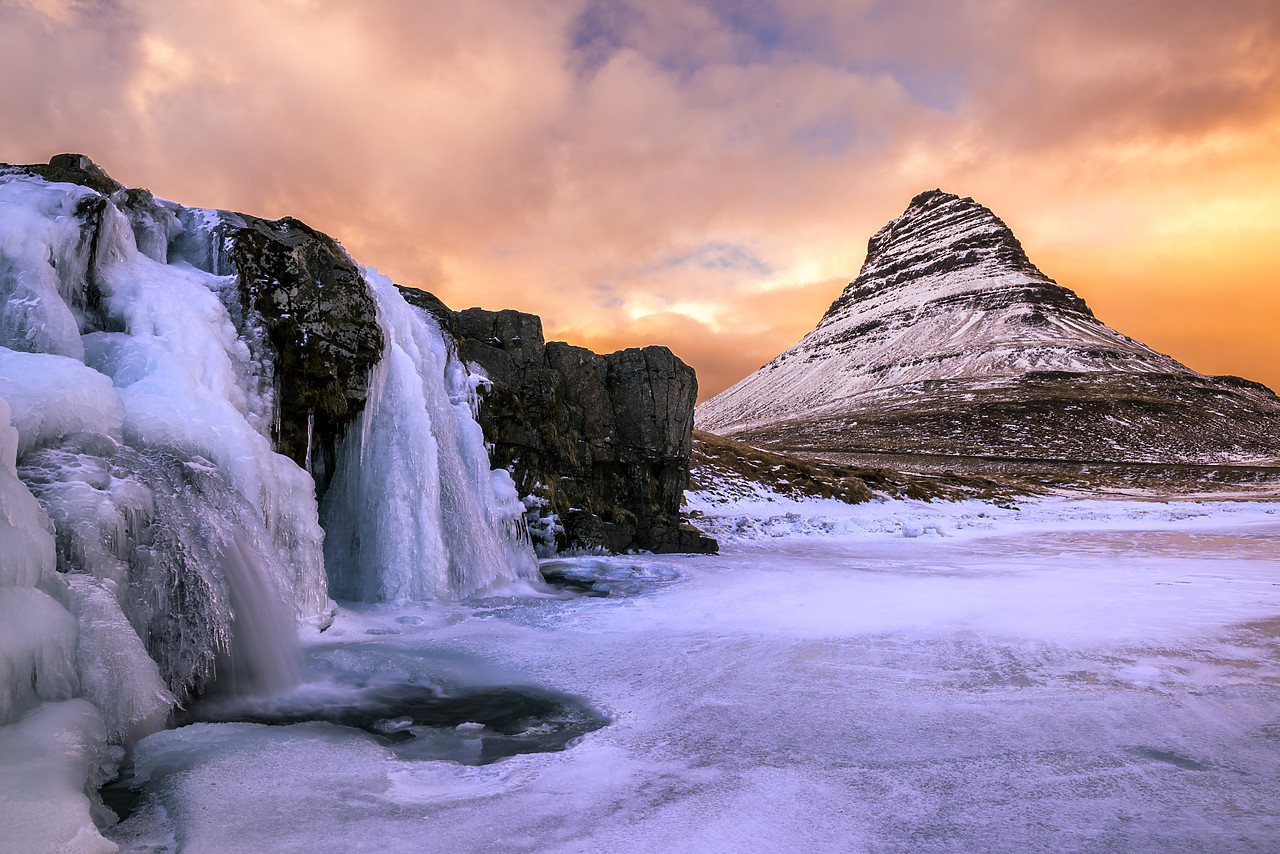 #150084-1 - Frozen Waterfall and Kirkjufell at Sunset, Iceland