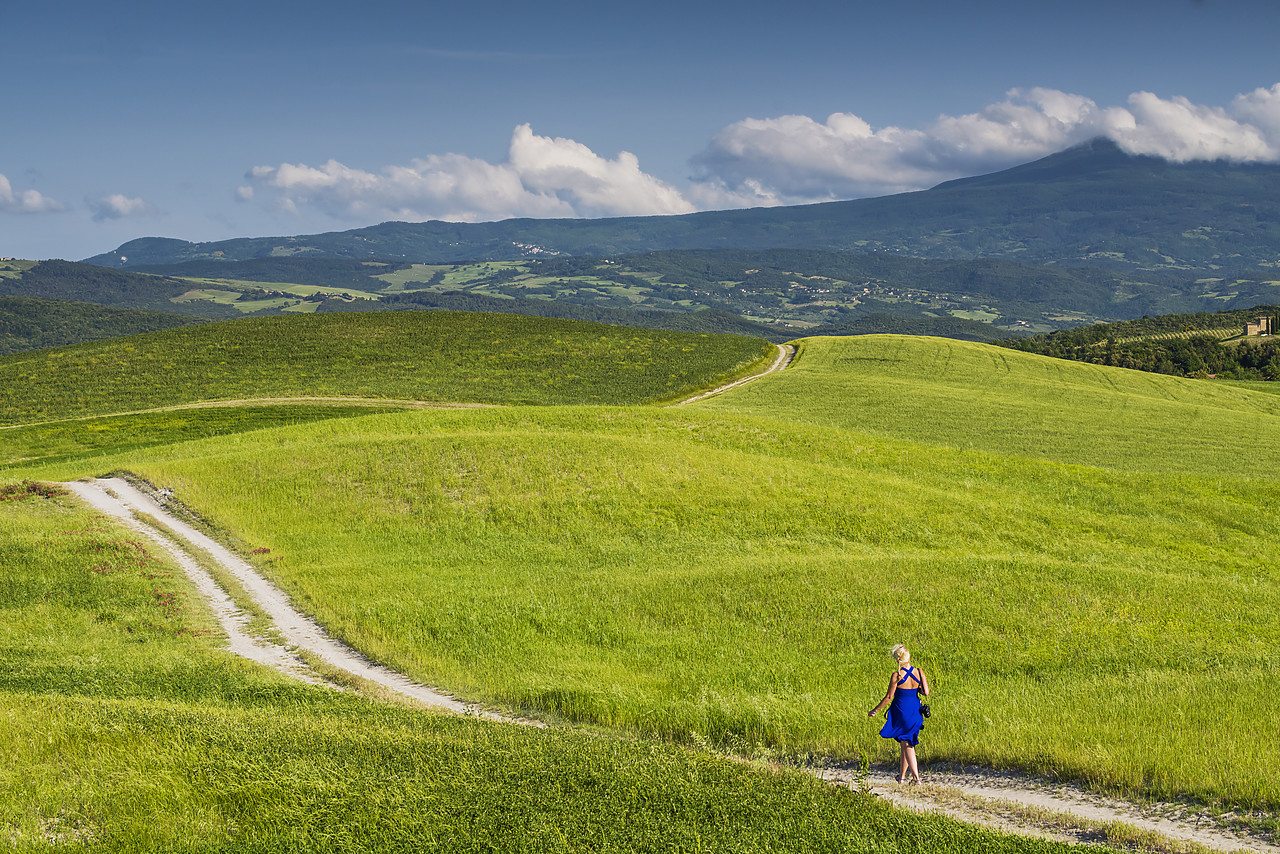 #150284-1 - Woman Walking in Tuscan Countryside, Tuscany, Italy