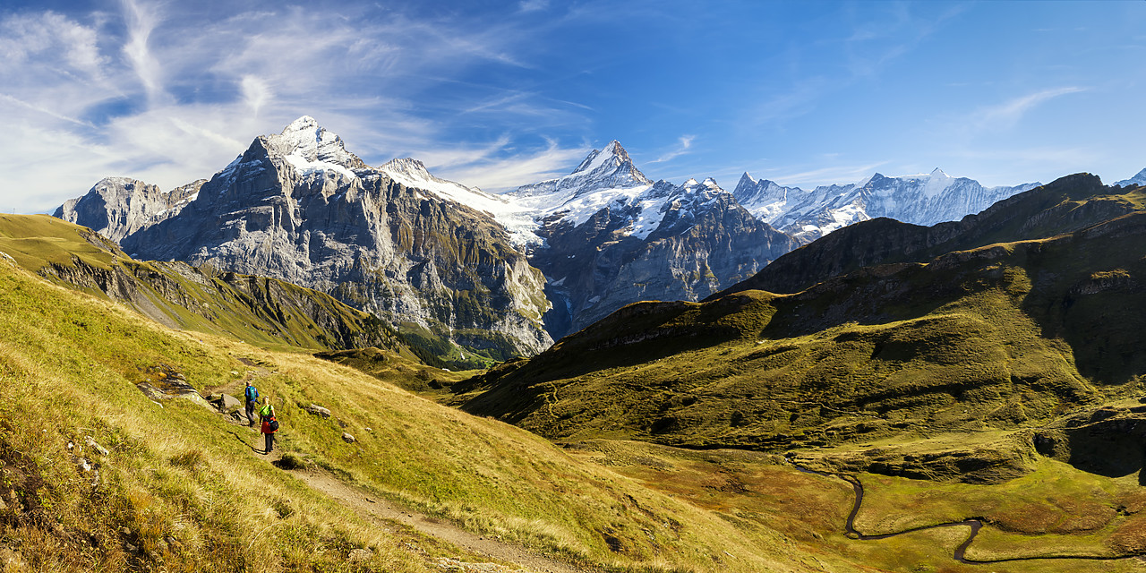 #180417-1 - Hikers viewing Wetterhorn & Schreckhorn, Grindelwald, Bernese Oberland, Switzerland